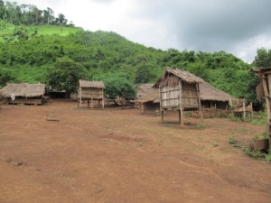 Hmong tribe, northern Laos (note the gathering rain clouds).