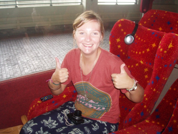 Me, happy on a very comfortable bus from Malaysia to Singapore.