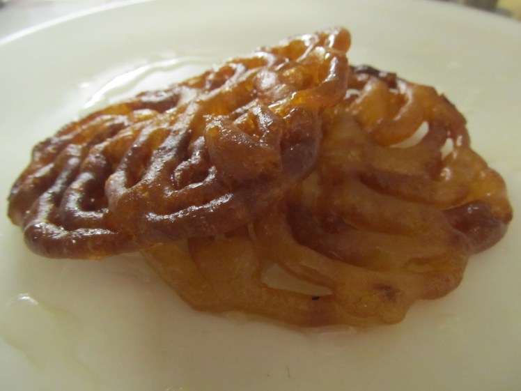 Jalebi is basically deep-fried syrup. And damn, it's good.
